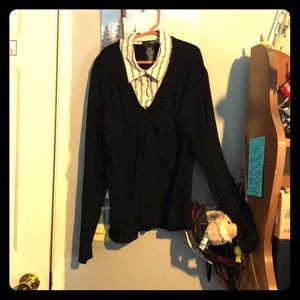 Black sweater with a button up collar.